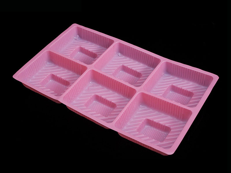 化妆品粉色吸塑内托